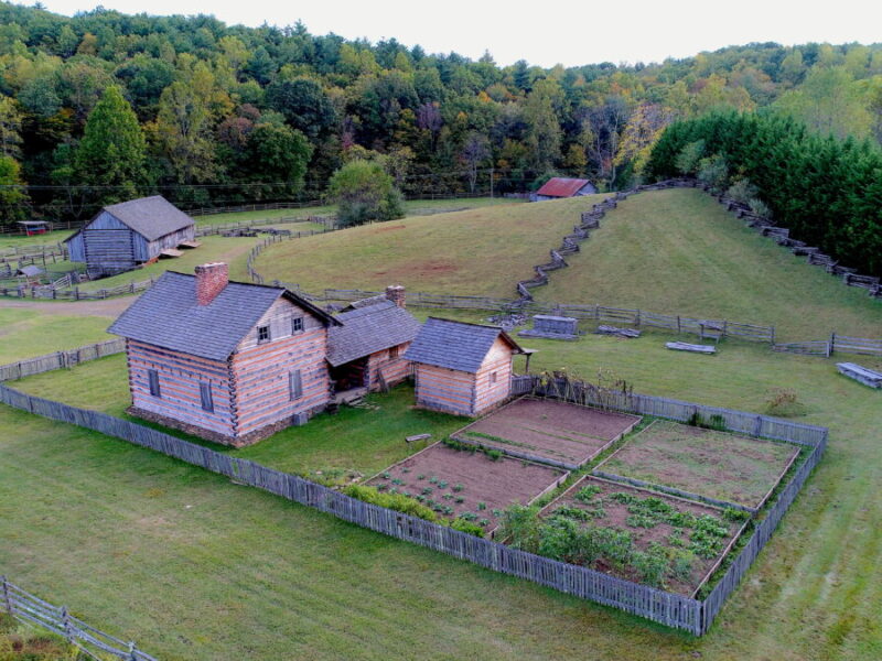 Blue Ridge Farm Museum offers a view of a historic farmstead including structures and gardens.